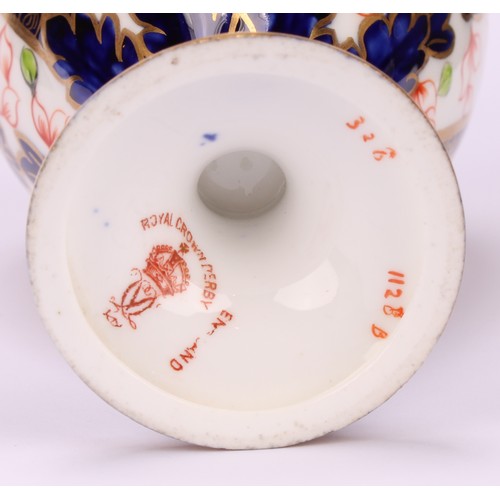 212 - A Royal Crown Derby 1128 Imari pattern pedestal ewer, scroll handle with mask terminal, circular bas... 