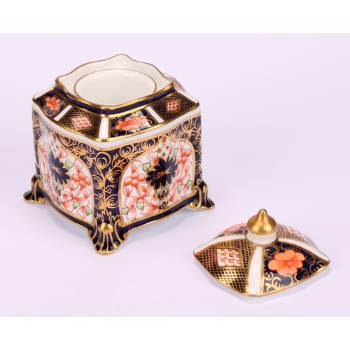 213 - A Royal Crown Derby 1128 Imari pattern shaped square inkwell, of casket form, the domed cover enclos... 