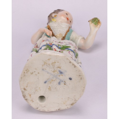 276 - A Meissen porcelain figure, of a girl wearing a floral dress, with posies in hand, scroll base, pick... 