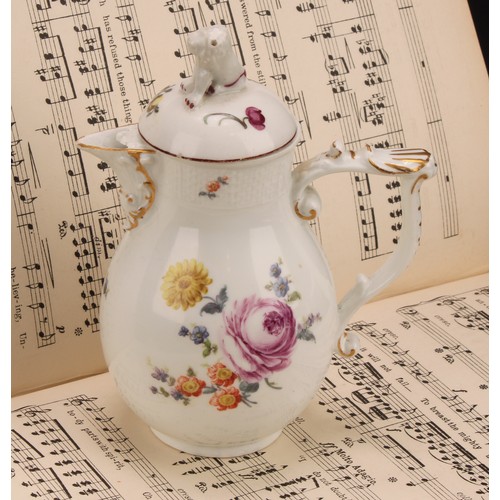 278 - A mid 18th century Meissen baluster jug and cover, painted with flowers, moulded basket weave border... 