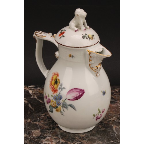 278 - A mid 18th century Meissen baluster jug and cover, painted with flowers, moulded basket weave border... 