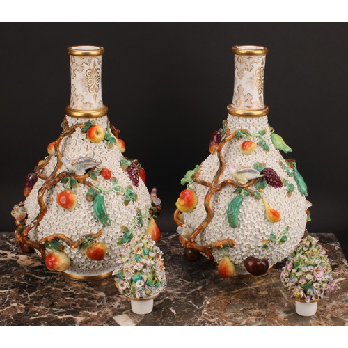 287 - A pair of Meissen schneeballen bottle vases and covers, typically encrusted and applied with birds a... 