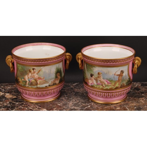 285 - A pair of French porcelain ice pails or jardinieres, painted with courting putti, with river landsca... 