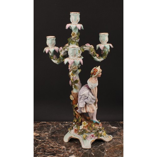 289 - A pair of Sitzendorf figural four-light candelabra, modelled as a courting couple, each painted in p... 