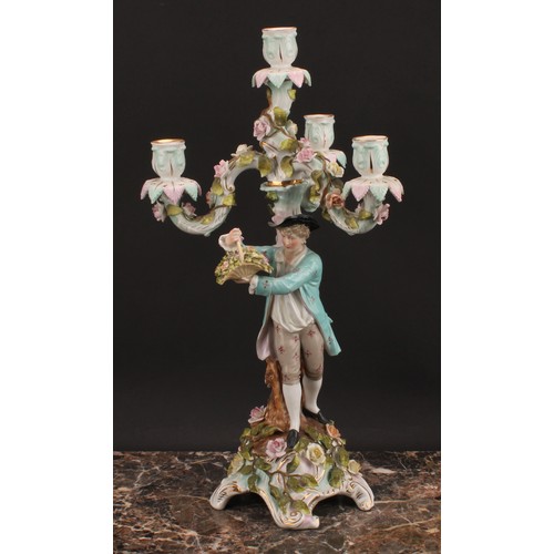 289 - A pair of Sitzendorf figural four-light candelabra, modelled as a courting couple, each painted in p... 