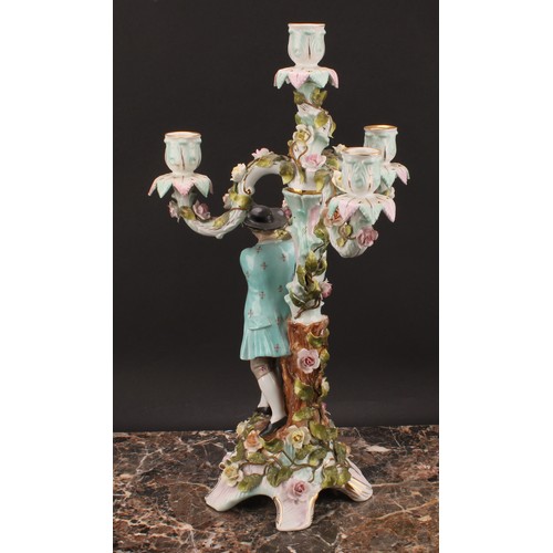 289 - A pair of Sitzendorf figural four-light candelabra, modelled as a courting couple, each painted in p... 