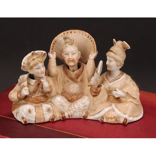 269 - A Continental porcelain nodding head figure group, of two Geisha and Japanese man of title, decorate... 