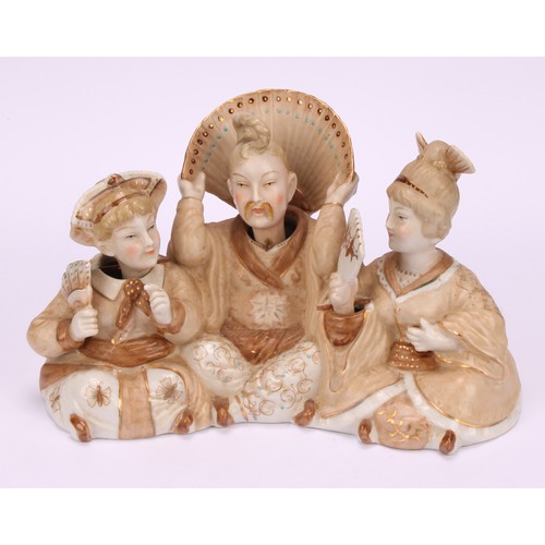 269 - A Continental porcelain nodding head figure group, of two Geisha and Japanese man of title, decorate... 