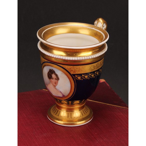 265 - A 19th century pedestal chocolate or cabinet cup, probably Vienna, painted with a portrait of a youn... 