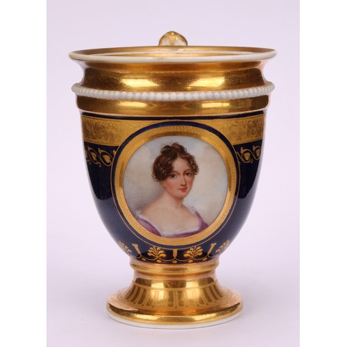 265 - A 19th century pedestal chocolate or cabinet cup, probably Vienna, painted with a portrait of a youn... 