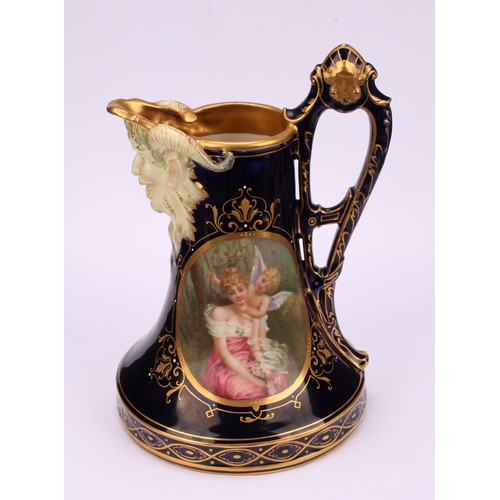 295 - A Vienna porcelain jug, the central oval cartouche painted with Cupid and Psyche, Bacchic mask spot,... 