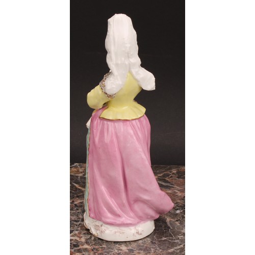 298 - An Edmé Samson & Cie porcelain figure, Précieuse, she stands dressed in the Spanish fashion, 19cm hi... 