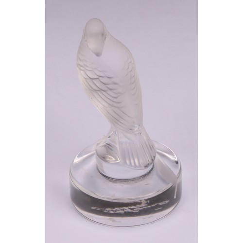 300 - A Lalique frosted glass place card holder, modelled as a turtle dove preening, circular base, engrav... 