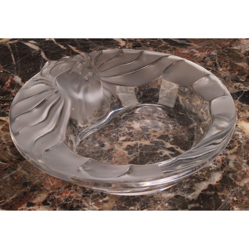 303 - A Lalique Tete de Lion circular glass dish, the rim with frosted stylised lion mask with spreading m... 