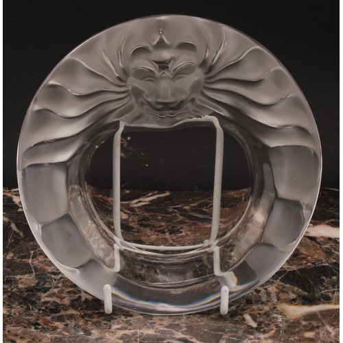 303 - A Lalique Tete de Lion circular glass dish, the rim with frosted stylised lion mask with spreading m... 