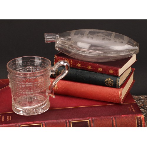 313 - Railway Interest - steam locomotives, an early 19th century clear glass oval flask, hand engraved wi... 