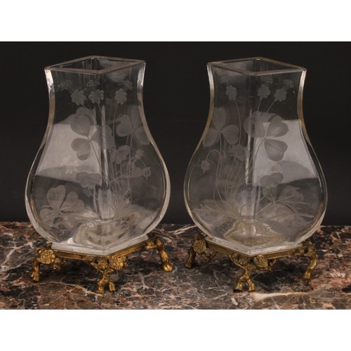 308 - A pair of Continental ormolu mounted clear glass vases, each etched in the Art Nouveau taste with cl... 