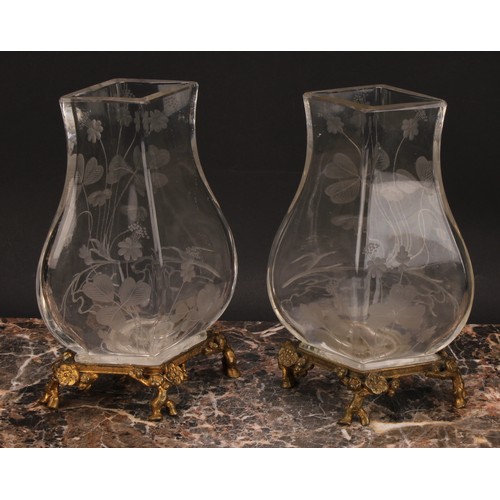 308 - A pair of Continental ormolu mounted clear glass vases, each etched in the Art Nouveau taste with cl... 