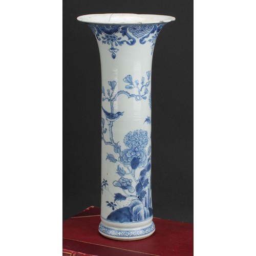 374 - An 18th century Chinese blue and white sleeve vase, decorated with birds flying and perched amongst ... 