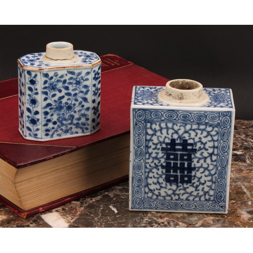 321 - A Chinese canted rectangular tea caddy, painted in tones of underglaze blue with flowers and leafy b... 