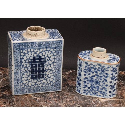 321 - A Chinese canted rectangular tea caddy, painted in tones of underglaze blue with flowers and leafy b... 