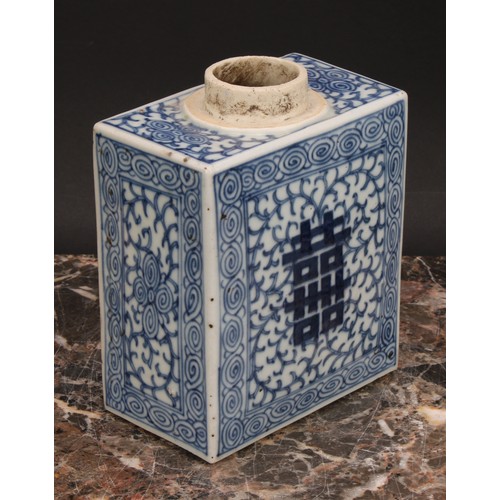 321 - A Chinese canted rectangular tea caddy, painted in tones of underglaze blue with flowers and leafy b... 