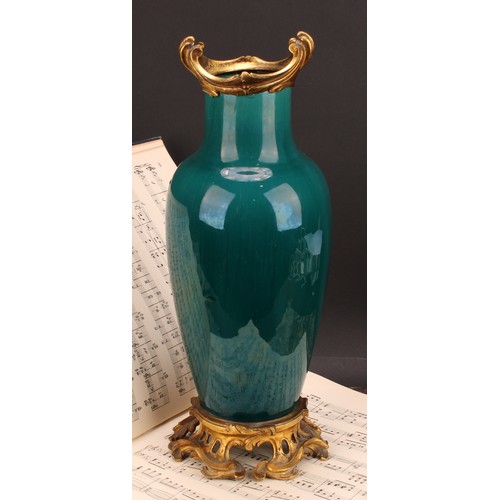 378 - An early 20th century ormolu mounted monochrome vase, glazed in streaked tones of mottled turquoise,... 