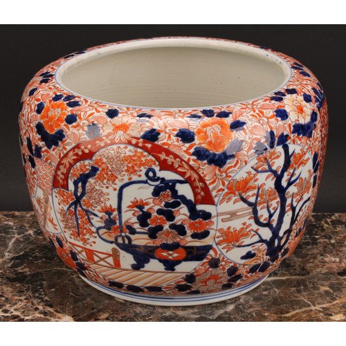 353 - A Japanese ovoid jardiniere, painted in the Imari palette, 27cm diam, Meiji period