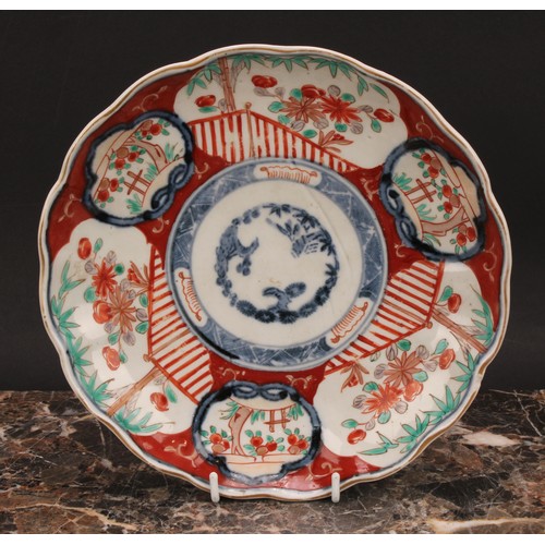 351 - A Japanese circular dish, painted in the Imari palette, 30.5cm diam, Meiji period; others, similar (... 