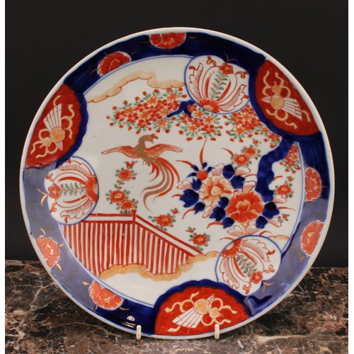 351 - A Japanese circular dish, painted in the Imari palette, 30.5cm diam, Meiji period; others, similar (... 