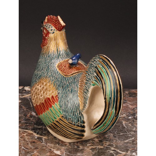 360 - A Japanese satsuma teapot, as a cockerel, painted in polychrome and picked out in gilt, 18cm long, c... 