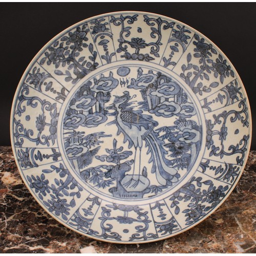 367 - A pair of 17th century Chinese shipwreck porcelain dishes, painted in tones of underglaze blue with ... 