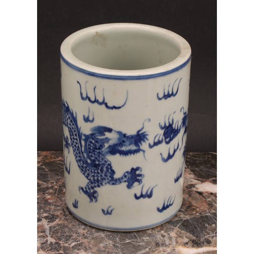 318 - A 19th century Chinese stem cup, decorated in underglaze blue with central flowerhead and foliate sc... 