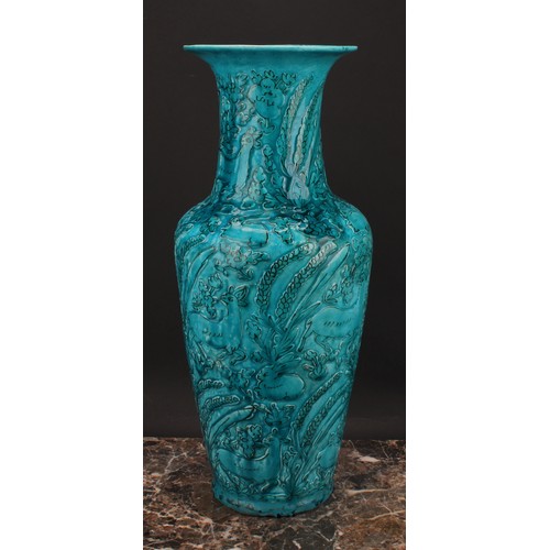 327 - A Chinese ovoid vase, glazed in turquoise, moulded in the Archaic manner, with stylised deer and rab... 