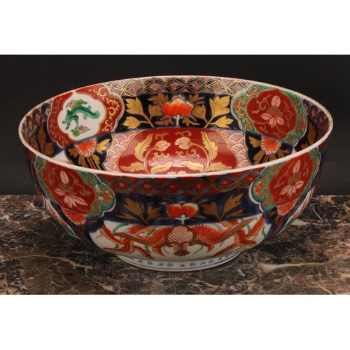 355 - A Japanese porcelain bowl, decorated in the Imari palette, 25cm diameter, Meiji period