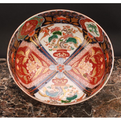 355 - A Japanese porcelain bowl, decorated in the Imari palette, 25cm diameter, Meiji period