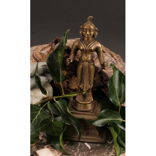 329 - A 19th century Indian murti or shrine figure, cast as a Hindu deity, 20.5cm high, 19th century