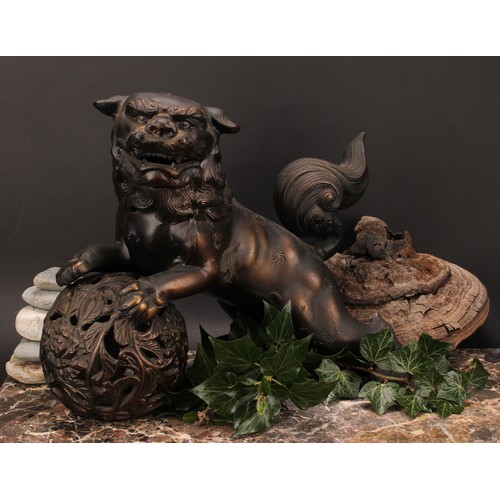 380 - A Japanese bronzed metal koro or incense burner, as a Chinese guardian lion, 32.5cm high