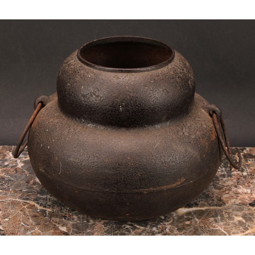 343 - A Japanese bronze tripod koro, 14cm high; a Japanese cast iron chagama, 17cm high (2)