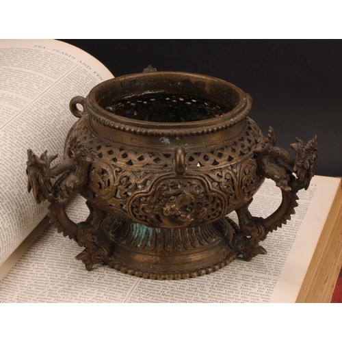 331 - A Chinese bronze hanging censer, pierced and cast with dragons, temple lions and scrolls, 18.5cm dia... 