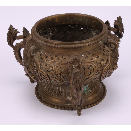 331 - A Chinese bronze hanging censer, pierced and cast with dragons, temple lions and scrolls, 18.5cm dia... 