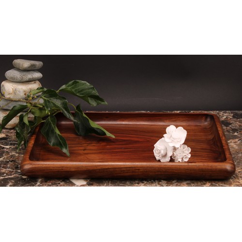 335 - A Chinese huanghuali rectangular tray, 35cm wide