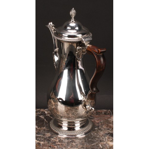 795 - A George III silver baluster coffee pot, quite plain, hinged domed cover with wrythen finial, scroll... 