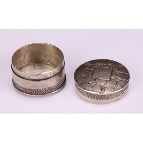 806 - A George III silver circular pill box or bonbonniere, push-fitting cover, bright-cut engraved with w... 