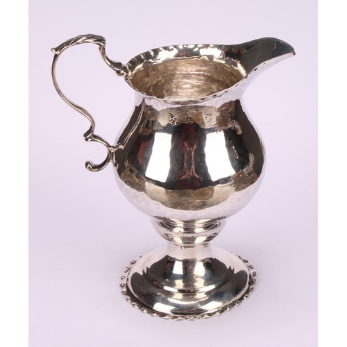 796 - A George III silver baluster cream jug, acanthus-capped scroll handle, crimped borders, 11cm high, L... 