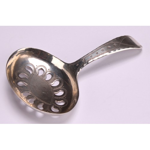 802 - A George III silver caddy spoon, oval pierced bowl, wriggle-work engraved, 7cm long, Joseph Taylor, ... 