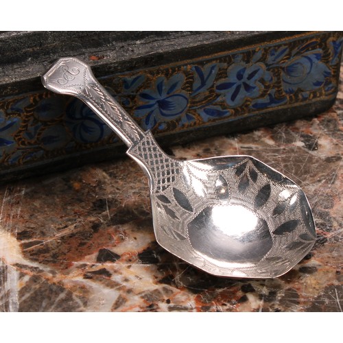 801 - A George III silver caddy spoon, octagonal bowl, bright-cut and wriggle-work engraved, 7.5cm long, J... 