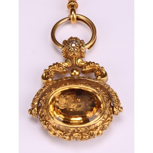 1252 - A 19th century gilt metal swivel fob seal, citrine and chalcedony matrices intaglio engraved with ar... 