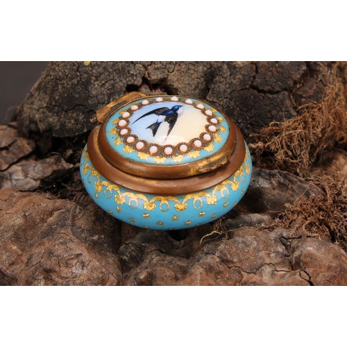 1250 - A 19th century French Palais Royal enamel circular rouge box, hinged cover decorated with a swallow,... 