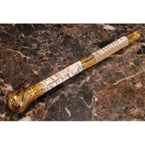 1251 - A 19th century gilt metal mounted mother of pearl parasol handle, the fittings spirally fluted and c... 